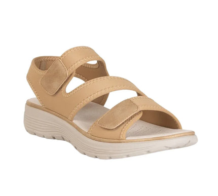 Beige comfort sandal with adjustable velcro straps and cushioned sole on white background