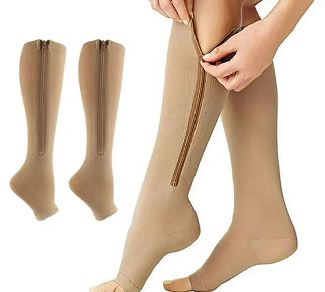 Beige open-toe compression socks with zipper, shown being worn and displayed separately